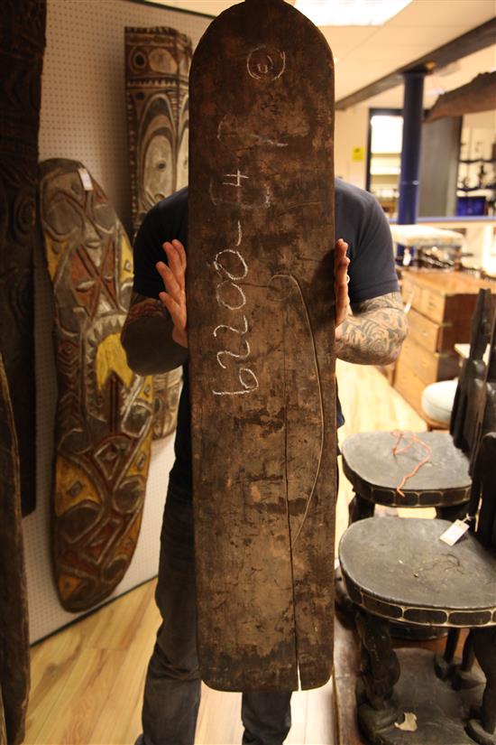 Sepik River carved wooden gope board and two other boards